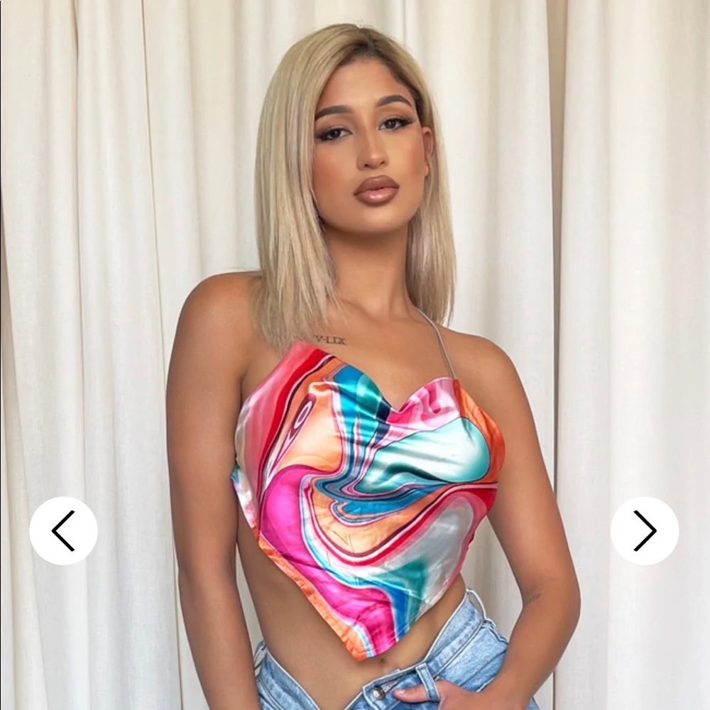 Brand new never worn HoneyBum sexy crop top. Didn’t fit me sadly